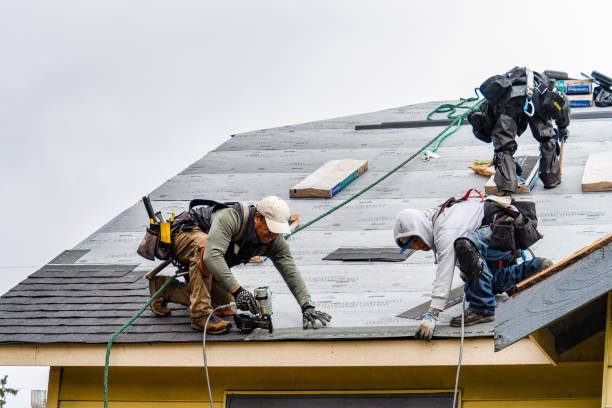 Professional Gutter Installation technician working in Norwood, OK